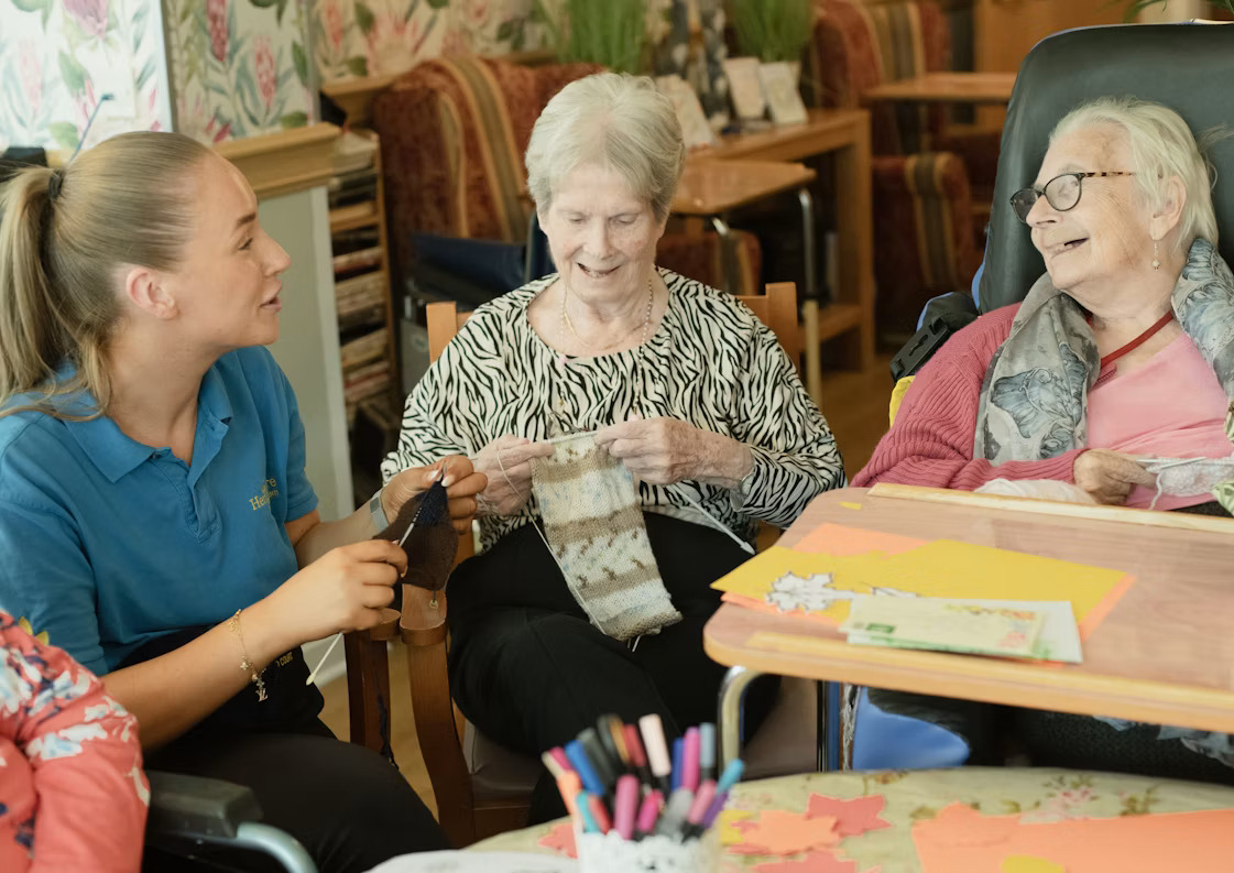 Caregiver providing compassionate in-home support to an elderly client